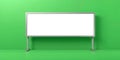 A blank whiteboard with a silver frame stands against a vibrant green background in a studio Royalty Free Stock Photo