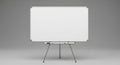 Blank whiteboard on tripod stand in minimalist gray room Royalty Free Stock Photo
