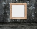 Blank whiteboard with wooden frame on dark mottled concrete room Royalty Free Stock Photo