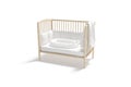 Blank wood cot with white crib sheet and nest mockup Royalty Free Stock Photo