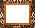 Blank wood frame on leopard texture Royalty Free Stock Photo