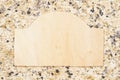 Blank wood sign on brown marble textured paper