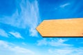 Blank wooden arrow over clear blue sky with copy space Royalty Free Stock Photo