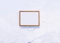 Blank Wooden Photo Frame on white textured wall Background Royalty Free Stock Photo