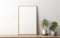 Blank wooden picture frame mockup on off white wall in modern interior. Vertical artwork template mock up for artwork, painting, Royalty Free Stock Photo