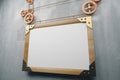 Blank wooden picture frame in steampunk style on concrete wall, Royalty Free Stock Photo