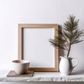 Blank wooden picture frame. Vase with pine tree branches, cup of coffee on desk created with Generative AI