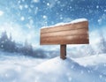 Blank wooden sign in snow landscape during blizzard in winter