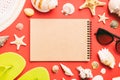 Blank writing book with summer beach accessories on background, copy space. Flat lay with copy space Royalty Free Stock Photo