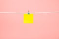 Blank yellow paper note on the string Royalty Free Stock Photo