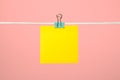 Blank yellow paper note on the string Royalty Free Stock Photo