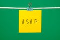 Blank yellow paper sheet on the string Royalty Free Stock Photo