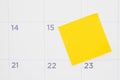 Blank yellow sticky note on a calendar Royalty Free Stock Photo