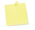 Blank Yellow To-Do List Post-It Style sticker, paperclip, isolated copy space, large detailed closeup Royalty Free Stock Photo