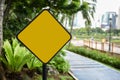 Blank yellow traffic sign at park Royalty Free Stock Photo