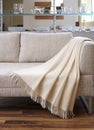 Blanket draped over a settee Royalty Free Stock Photo