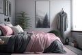 Blankets in pink and grey, a carpet, and posters decorate a modest bedroom with copy space on a white wall Royalty Free Stock Photo