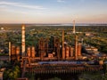 Blast furnace equipment of the metallurgical plant at the sunset, aerial view Royalty Free Stock Photo