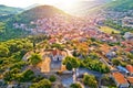 Blato on Korcula island historic town in green landscape aerial sun haze view