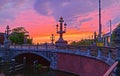 Blauwbrug Blue Bridge over Amstel river in Amsterdam at sunset spring evening, Holland.