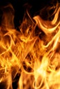 Blaze fire flame background. Abstract fire flame background. Fire flame texture. Texture of fire on black background. Flames on Royalty Free Stock Photo