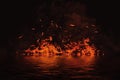 Blaze fire flame texture on isolated background with water reflection Royalty Free Stock Photo