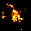 Blazing orange fire over Abstract orange smoke on a black background