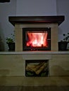 A blazing wood fire in fireplace Royalty Free Stock Photo