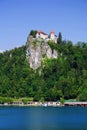 Bled lake and its imposing castle in the background. Royalty Free Stock Photo