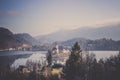 Bled castle on small island surrounded by lake hills forest Royalty Free Stock Photo