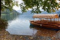 Bled lake in autumn, traditional wooden boats Pletna Royalty Free Stock Photo