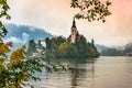 Bled lake in autumn, Slovenia. Mountain lake with small island, church and colorful sky. Royalty Free Stock Photo