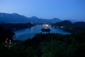 Bled Lake with Church Island and Castle Behind at Dusk Royalty Free Stock Photo