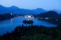 Bled Lake with Church Island and Castle Behind at Dusk Royalty Free Stock Photo