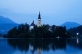 Bled Lake with Church Island and Castle Behind at Dusk Royalty Free Stock Photo