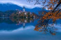 Bled lake and pilgrimage church at twilight reflected in water Royalty Free Stock Photo