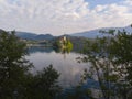 Bled, Slovenia - Aerial panoramic skyline view of Lake Bled Blejsko Jezero from high above with the Pilgrimage Church. Royalty Free Stock Photo