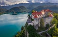 Bled, Slovenia - Aerial view of beautiful Bled Castle Blejski Grad with Pilgrimage Church of the Assumption of Maria Royalty Free Stock Photo