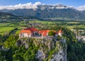 Bled, Slovenia - Aerial view of beautiful Bled Castle Blejski Grad with the Julian Alps and blue sky at background Royalty Free Stock Photo