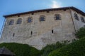 Walls of an old castle on the shore of Lake Bled in Slovenia against the sky Royalty Free Stock Photo