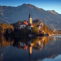 Bled, Slovenia - Beautiful autumn sunrise at Lake Bled with the famous Pilgrimage Church of the Assumption of Maria Royalty Free Stock Photo