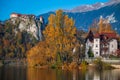 Bled, Slovenia - Beautiful orange foliage and trees at autumn with Blad Castle at background