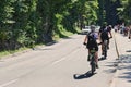 Bled, Slovenia - July 03, 2022: Couple road cycling uphill in Bled, Slovenia Royalty Free Stock Photo