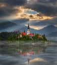 Bled, Slovenia - Misty sunrise at Lake Bled Blejsko Jezero with the Pilgrimage Church of the Assumption of Maria on an island Royalty Free Stock Photo