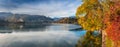 Bled, Slovenia - Panoramic view of beautiful autumn colors by the lake Bled with Pilgrimage Church of the Assumption of Maria Royalty Free Stock Photo