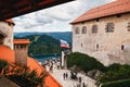 Bled, Slovenia - September, 8 2018: View of the The Bled Castle courtyard full with people, tower and castle buildings with cafes Royalty Free Stock Photo