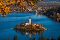 Bled, Slovenia - Sunrise at lake Bled taken from Osojnica viewpoint with traditional Pletna boat and Bled Castle at background Royalty Free Stock Photo