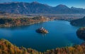 Bled, Slovenia - Sunrise at lake Bled taken from Osojnica viewpoint with traditional Pletna boats and Bled Castle Royalty Free Stock Photo