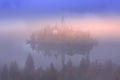 Bled, Slovenia view with church, misty morning Royalty Free Stock Photo