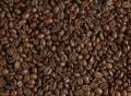 A blend of roasted Arabica and Robusta coffee beans background. ?offee of the highest quality Royalty Free Stock Photo